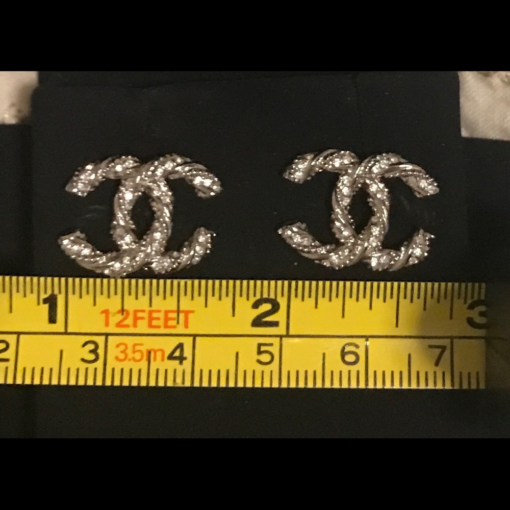 Chanel silver twisted crystal cc stud earrings